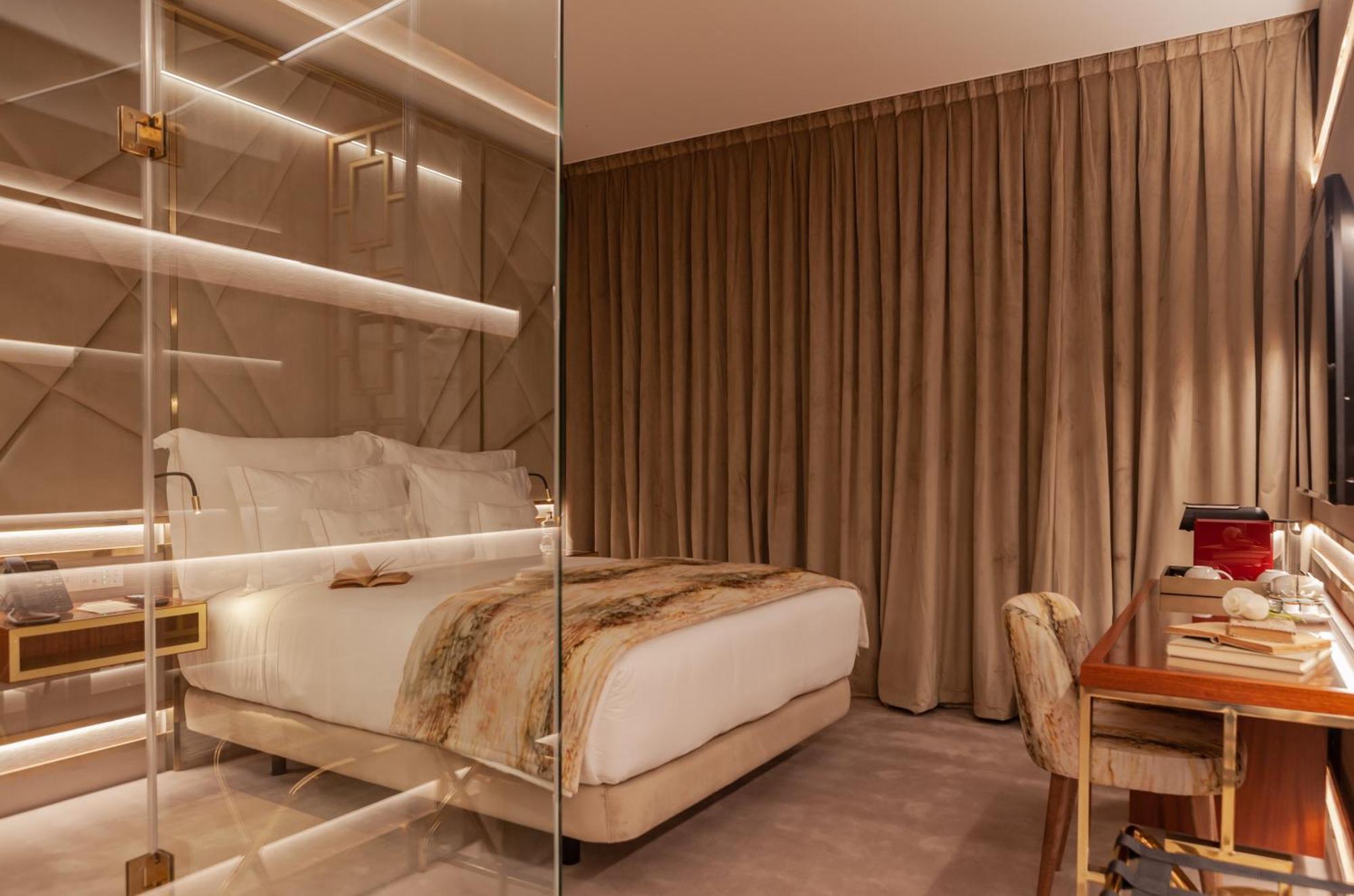 Wine & Books Lisboa Hotel ห้อง รูปภาพ A bedroom at the hotel